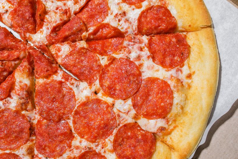 Sausage and pepperoni deep dish pizza