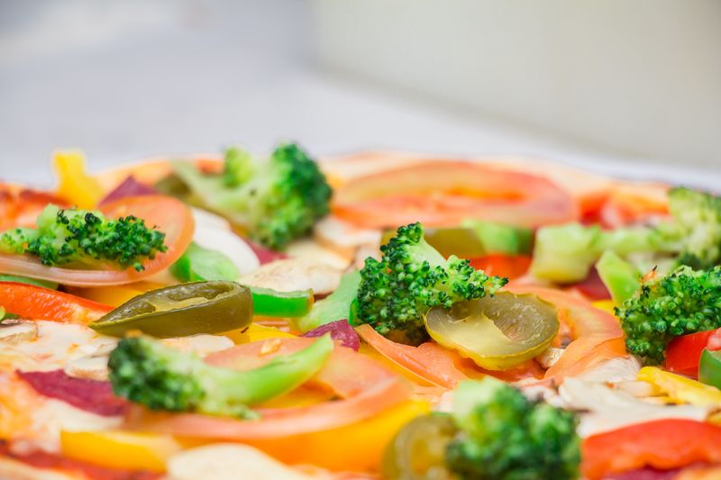 Veggie supreme deep dish pizza with colorful vegetables